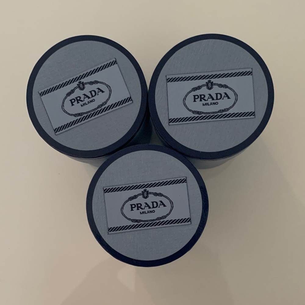 Prada Round Logo Boxes — Navy and Light Blue. Used to store Twillys. Set of 3